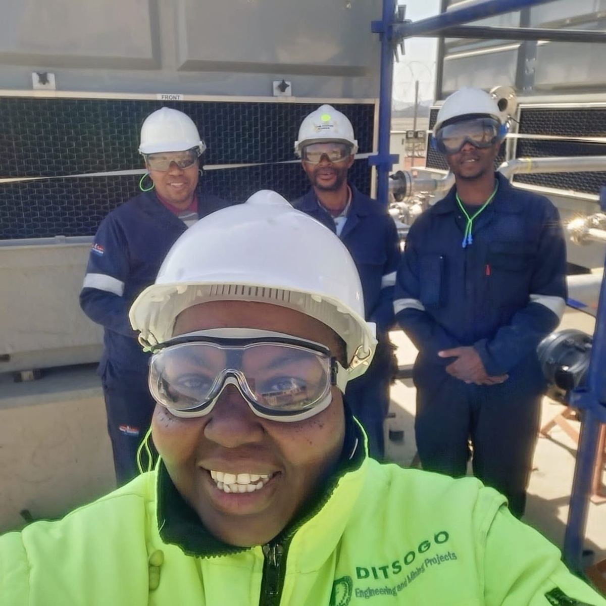 Ditsogo Group crew in branded PPE at a plant